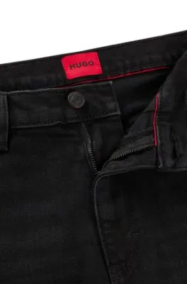 Vaqueros extra slim fit de denim elástico en color negro intenso