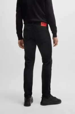 Vaqueros extra slim fit de denim elástico en color negro intenso