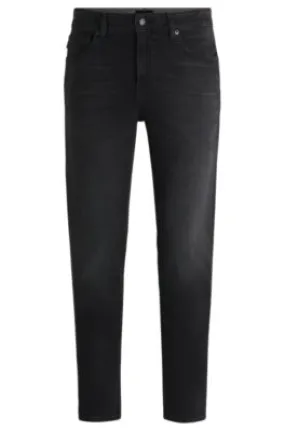 Vaqueros tapered fit de cómodo denim elástico negro