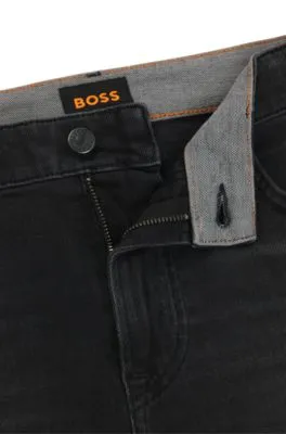 Vaqueros tapered fit de cómodo denim elástico negro